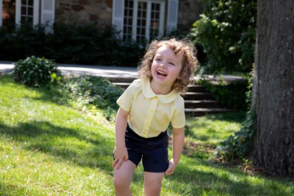 toddler in navy short yellow shirt 1500